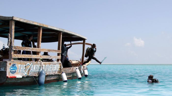 Divers and dhow