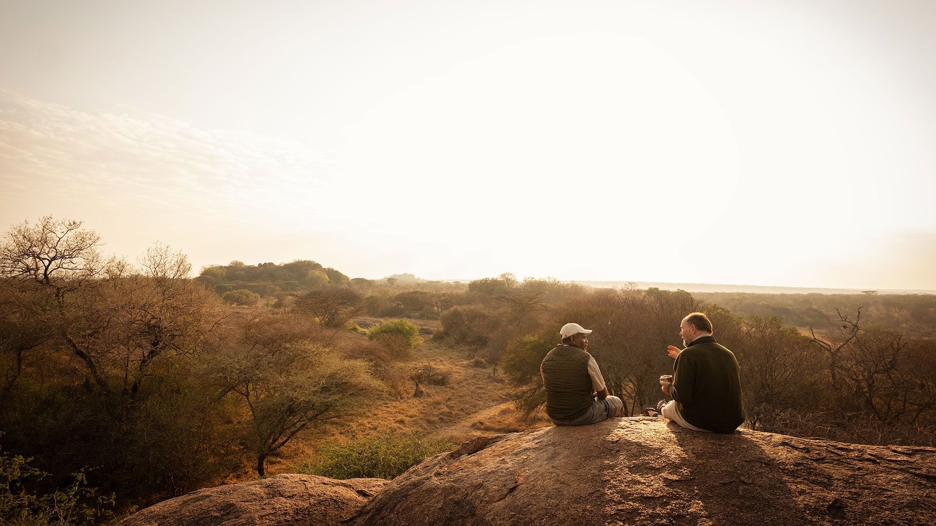 Seated on the Kusini Serengeti Kopjes with view towards Serengeti